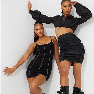 NWT TRENDY BLACK PLT RUNCHED TOGGLES MINI SKIRT